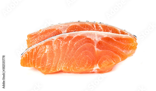 Piece of fresh salmon fillet sliced isolated on white background