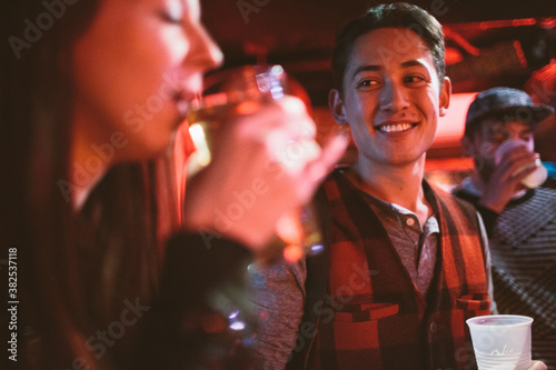 Friends drinking in a local Manhattan bar