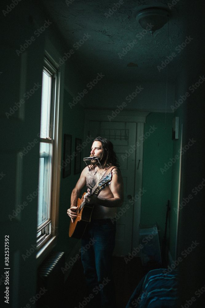 Struggling musician plays hopeful tunes in his Brooklyn apartment Struggling musician plays hopeful tunes in his Brooklyn apartment