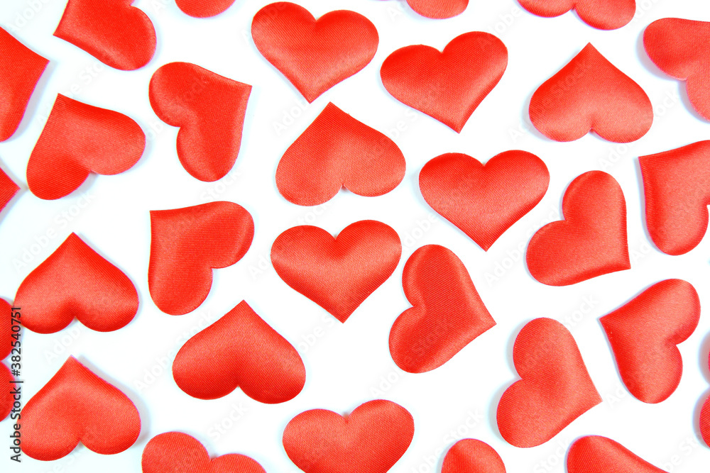  set of fabric red hearts on a white background, full background     
