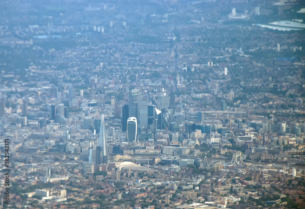 Overlooking the urban sprawl of the city of London from an airplane 