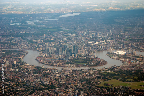 Overlooking the urban sprawl of the city of London from an airplane 