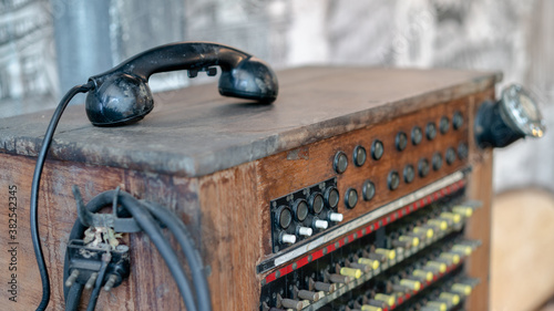 Historical, telecommunications system. Old vintage telephone switchboard.