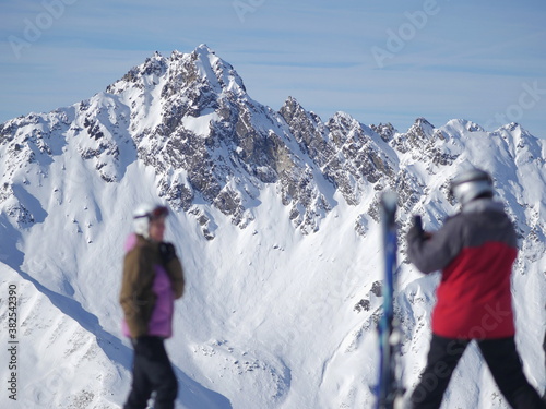 photographing mountain skiing photo