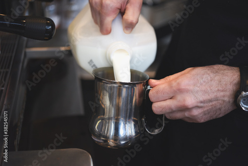 Bartender making an Italian cappuccino photo