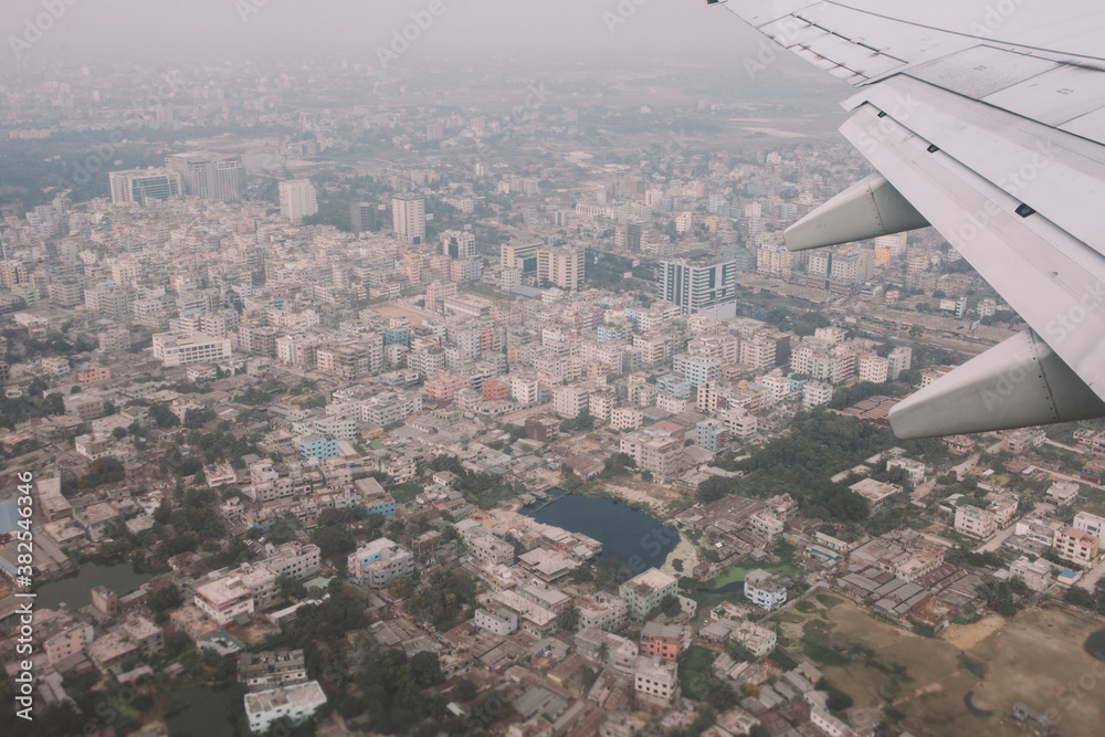 Flying over the asian city of Dhaka, Bangladesh. Flying over the asian city of Dhaka, Bangladesh.