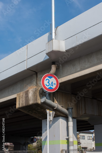 Wallpaper Mural height limit sign listed under the overpass Torontodigital.ca