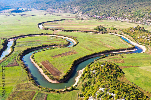 SEPTEMBER, 2020 - Aerial view of river Lika meandering through Donji Kosinj and Lipovo Polje villages in Croatia. © Vedrana