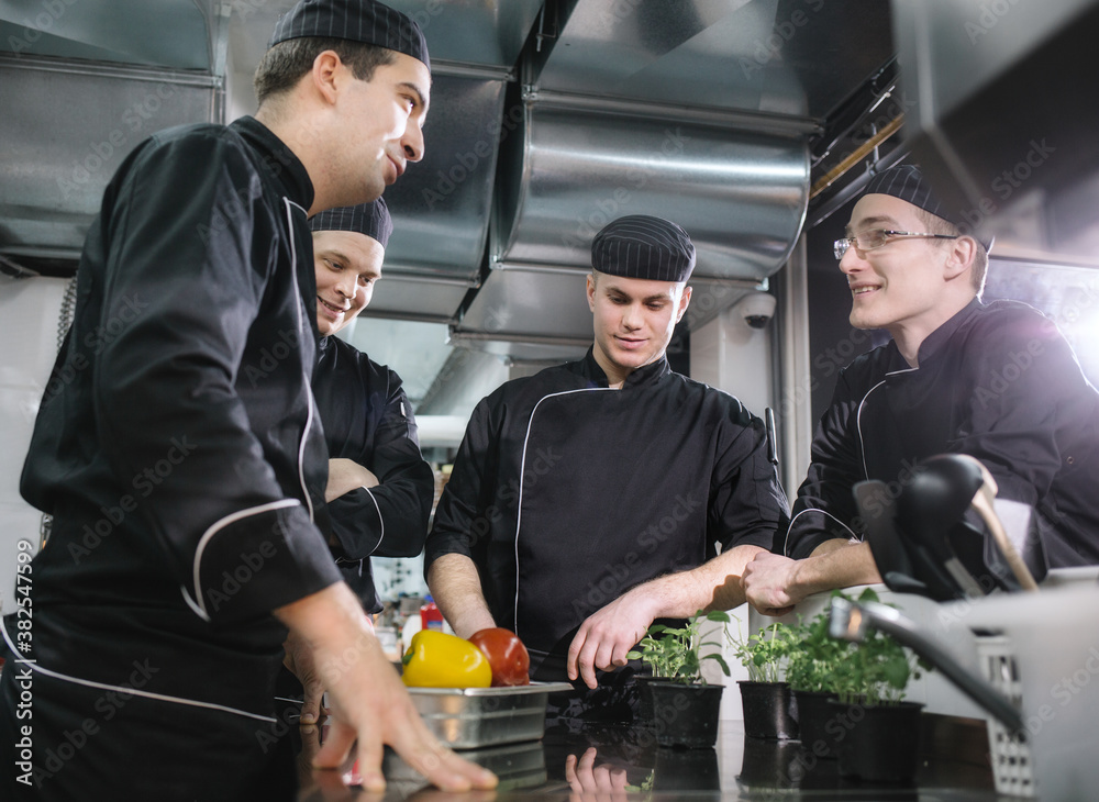 Chefs Talking in the Kitchen Chefs Talking in the Kitchen