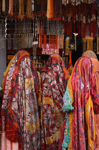 Indian Women Selects Jewelry At Market photo