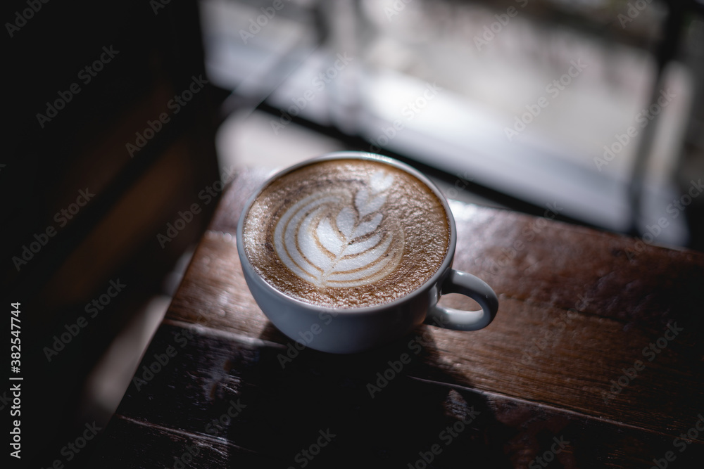 coffee on the wooden table from above. Urban coffee shop workspace or coffee break in morning coffee on the wooden table from above. Urban coffee shop workspace or coffee break in morning