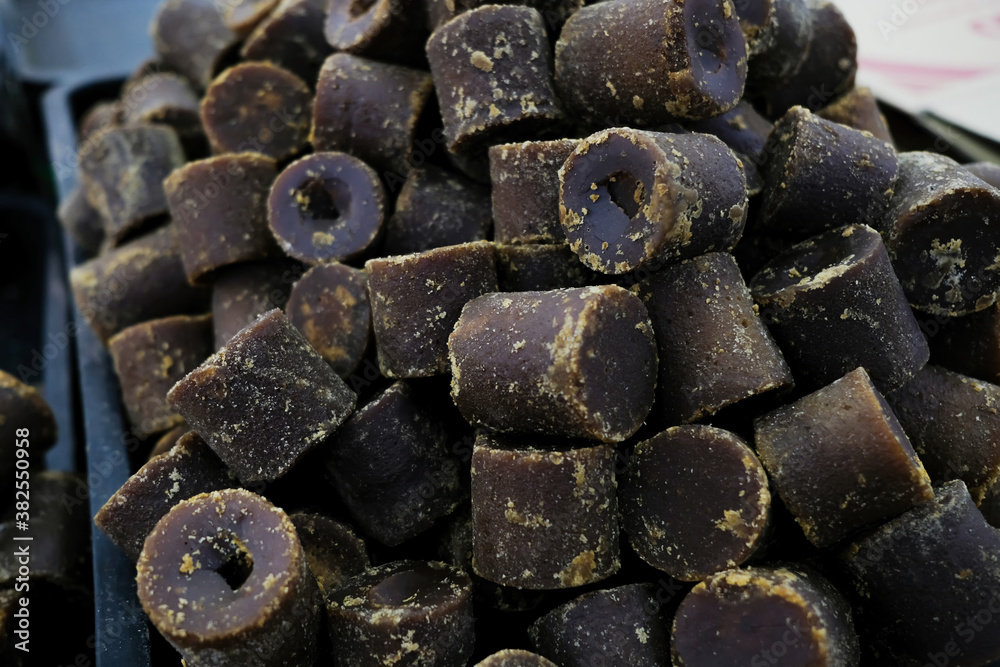 The sweet brown sugar displays on the market.