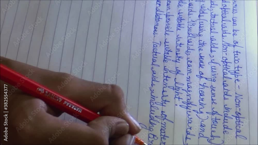 Timelapse, close-up, student writing in a notebook