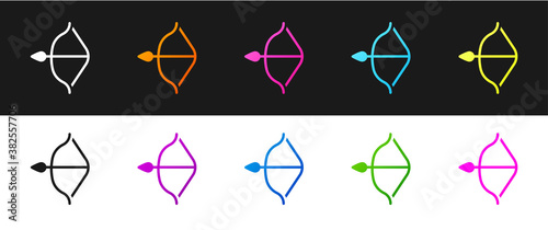 Set Medieval bow and arrow icon isolated on black and white background. Medieval weapon. Vector.