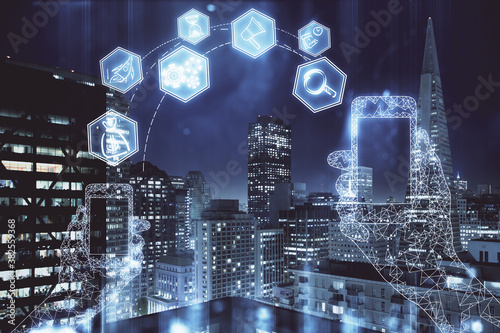 Double exposure of technology theme hologram and cityscape background. Concept of Hightech.