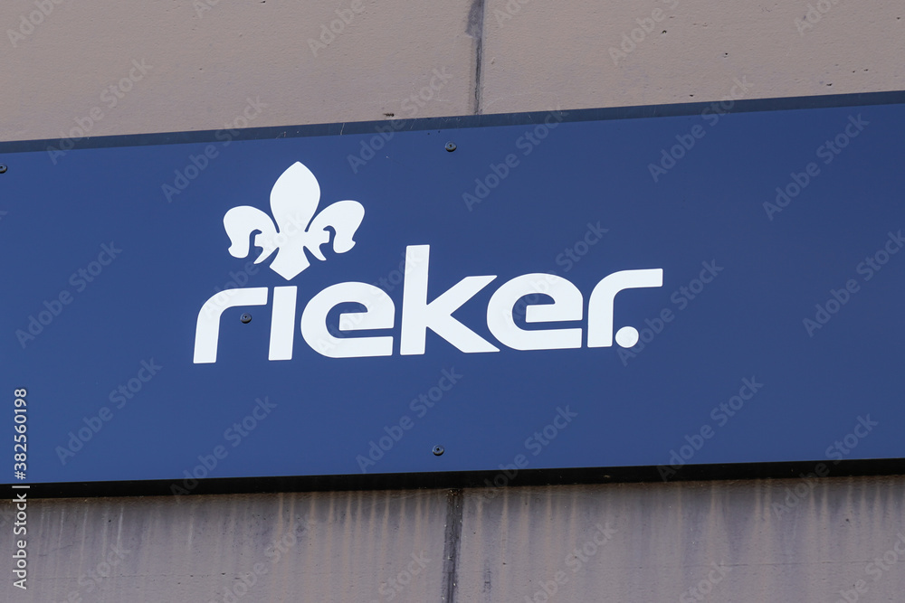 Rieker logo and sign text of shop German brand of shoes manufacturer in  front of store Stock Photo | Adobe Stock