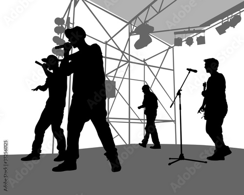 Young man with a microphone reads a rap. Stylized image on theme of hip hop