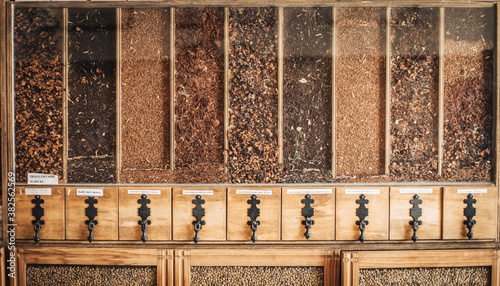 Fototapeta Naklejka Na Ścianę i Meble -  Antique display cabinet full of spices and tea