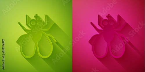 Paper cut Insect fly icon isolated on green and pink background. Paper art style. Vector.