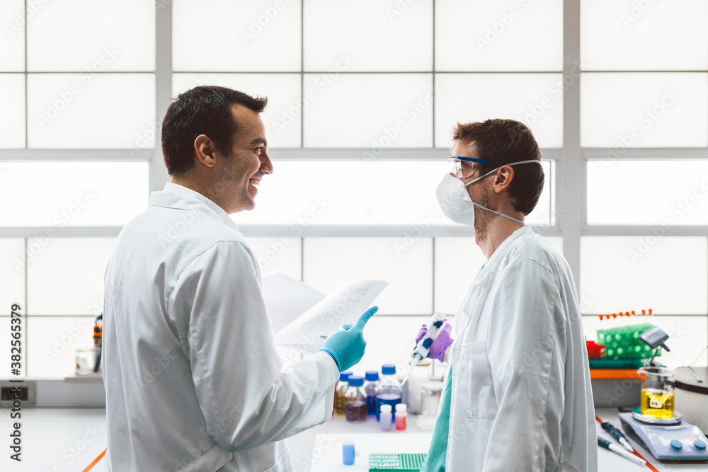Biologists Working in a Professional Laboratory Biologists Working in a Professional Laboratory