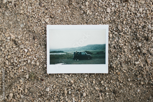 instant photograph on the ground