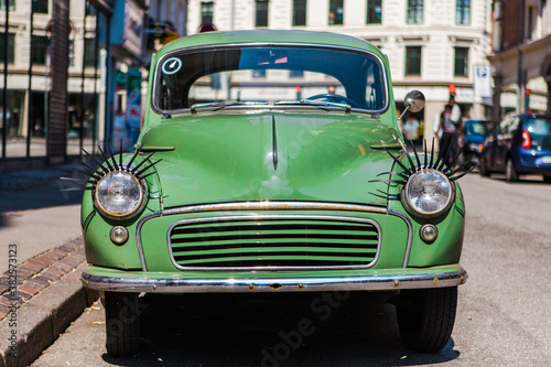 Retro car with eyelashes photo