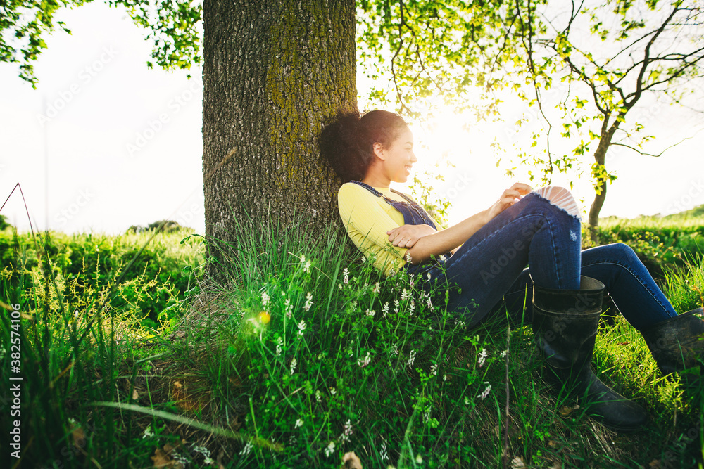 Woman relaxing in the nature at afternoon. Woman relaxing in the nature at afternoon.