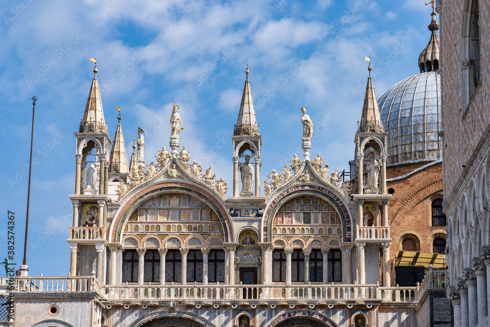 Naklejka premium St. Mark's square with iconic sights of St. Mark's basilica in Venice, Italy