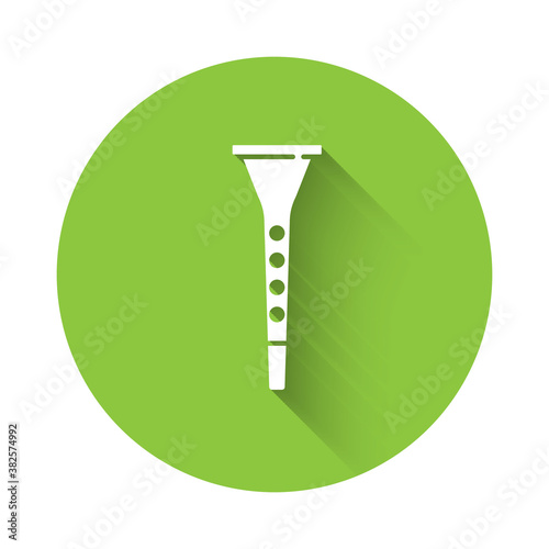 White Clarinet icon isolated with long shadow. Musical instrument. Green circle button. Vector.