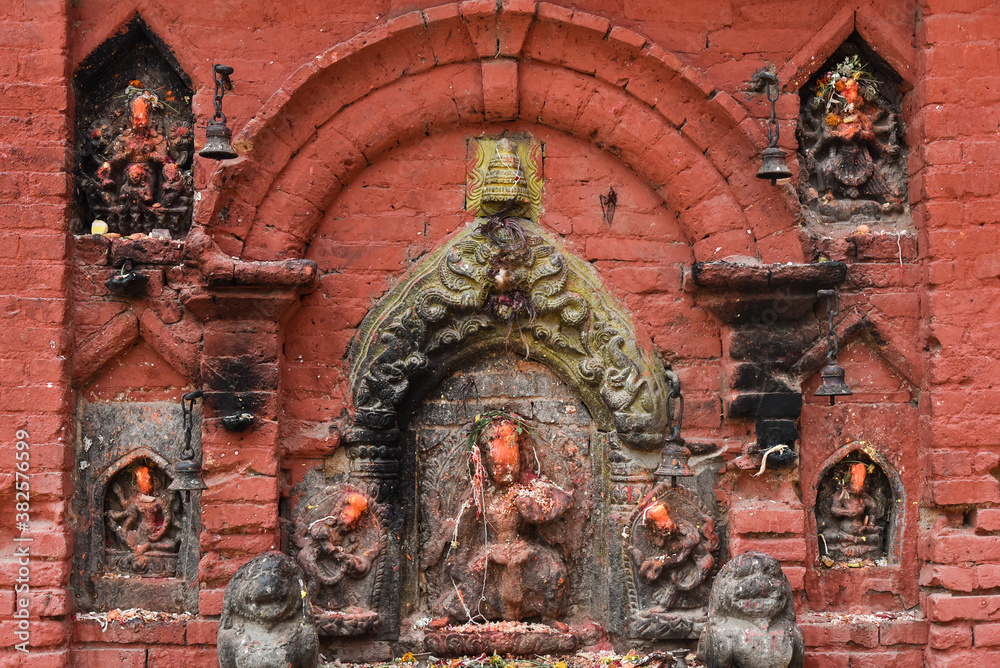 Statues of hindu gods on a wall. Statues of hindu gods on a wall.