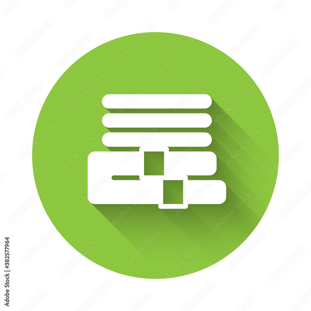 White Towel stack icon isolated with long shadow. Green circle button. Vector.