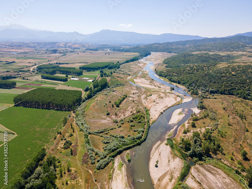 Struma river passing through the Petrich valley, Bulgaria photo