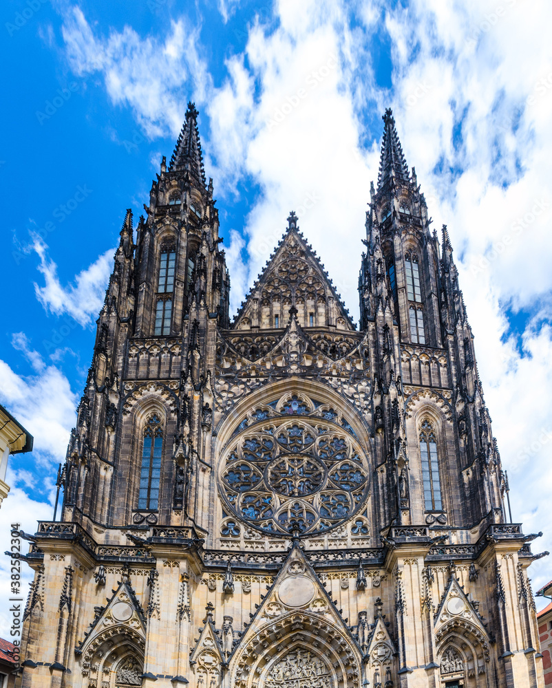 Facade exterior of St. Vitus Cathedral or The Metropolitan Roman Catholic Cathedral of Saints Vitus, Wenceslaus and Adalbert in Prague Castle Hradcany Lesser Town district, Bohemia, Czech Republic