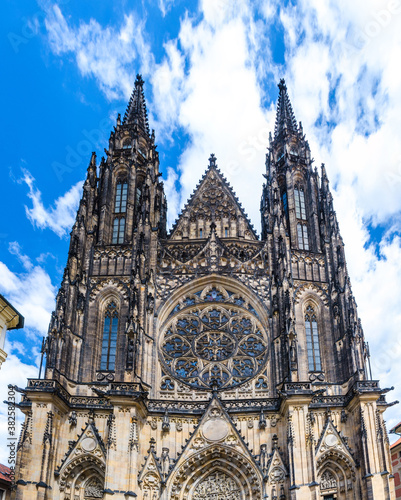 Facade exterior of St. Vitus Cathedral or The Metropolitan Roman Catholic Cathedral of Saints Vitus  Wenceslaus and Adalbert in Prague Castle Hradcany Lesser Town district  Bohemia  Czech Republic