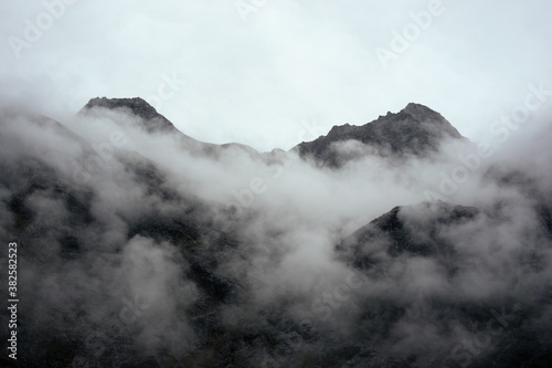 Mountain Fog creeps through the valley photo