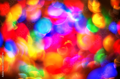 Beautiful colorful abstract background with christmas lights in boken. Amazing holiday texture for design.