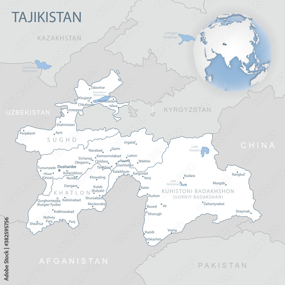 Blue-gray detailed map of Tajikistan administrative divisions and location on the globe.