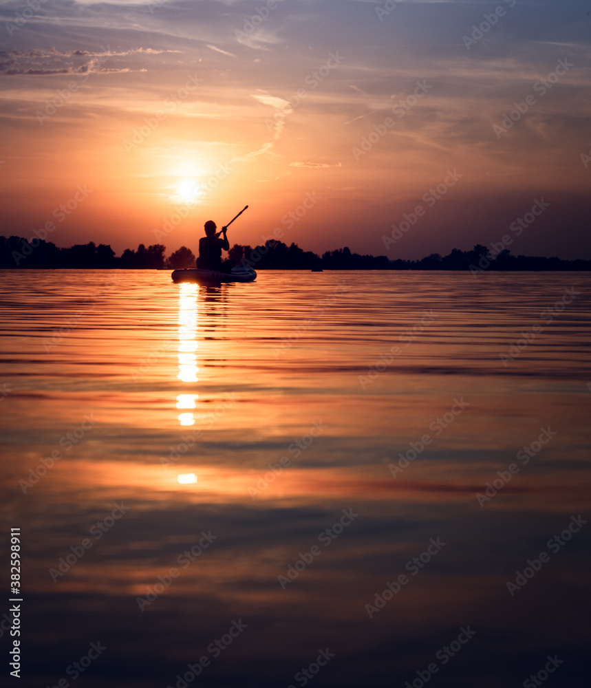 Stand Up Paddle Board at sunset