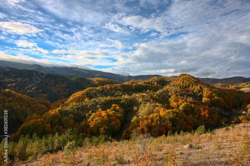 Wonderful landscape in autumn. Trees in yellow foliage. Mountain in fall colors.Colorful mountain landscape. Autumn in the mountains. © photokrle