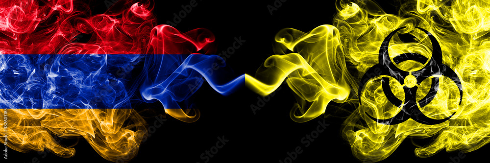 Armenia vs Biohazard, virus, covid19 smoky mystic flags placed side by side. Thick colored silky abstract smoke flags