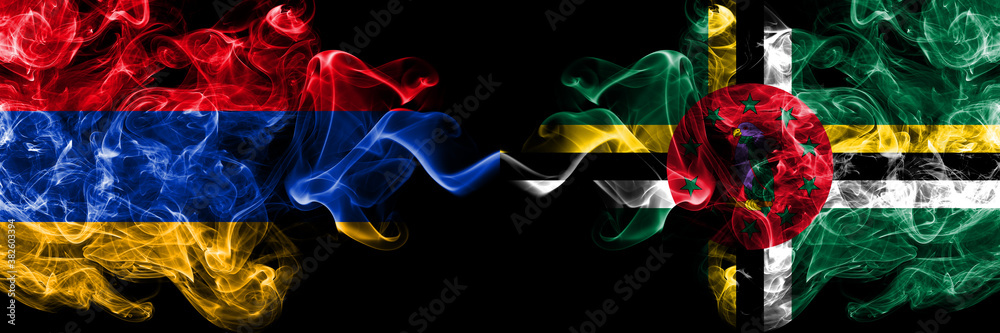 Armenia vs Dominica smoky mystic flags placed side by side. Thick colored silky abstract smoke flags