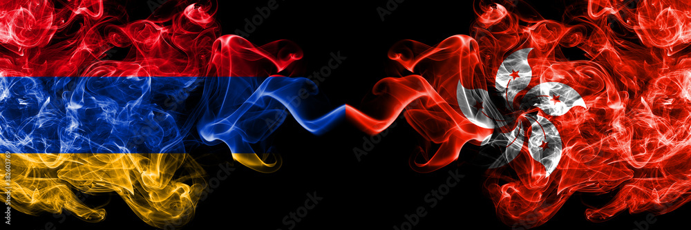 Armenia vs Hong Kong, China smoky mystic flags placed side by side. Thick colored silky abstract smoke flags