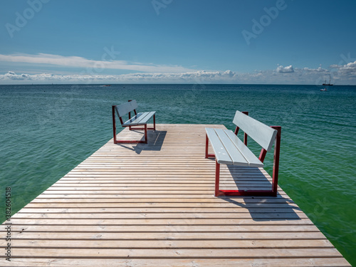 Baltic Sea Pier with benches reflect the opposite way of life