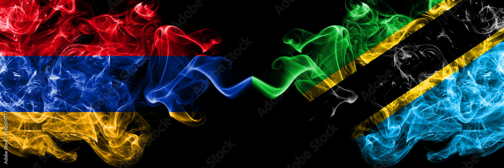 Armenia vs Tanzania, Tanzanian smoky mystic flags placed side by side. Thick colored silky abstract smoke flags