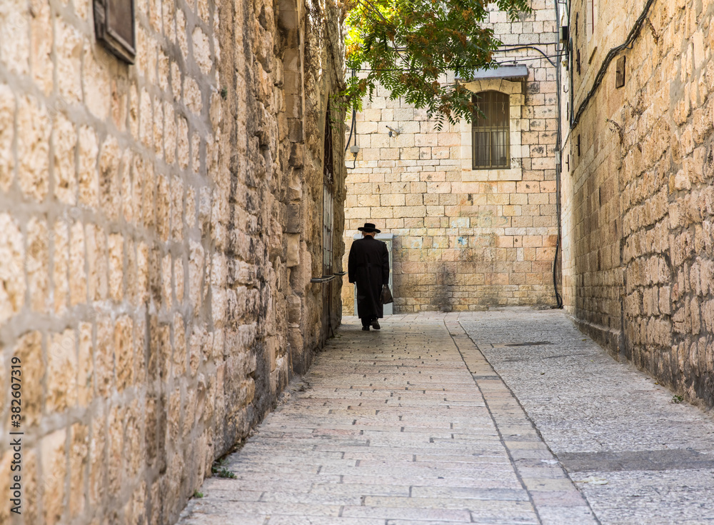historic street in the old city of jerusalem, israel