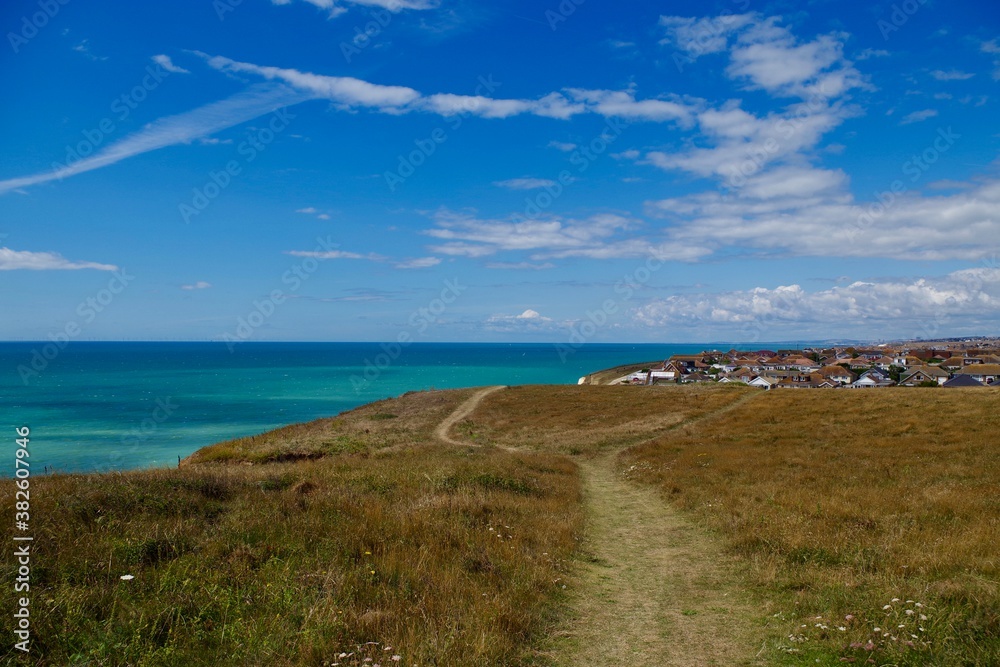 Views of the countryside, summer and a white cloudy skies over Peacehaven and Southdowns National Park, England
