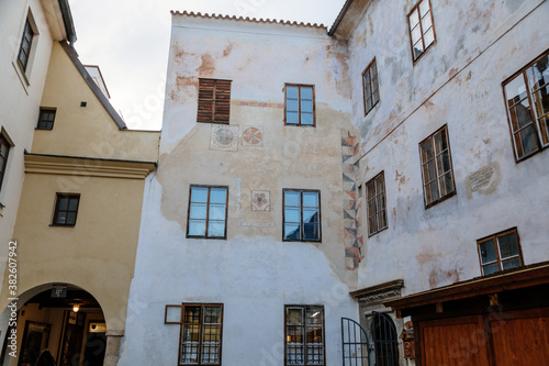Renaissance historical house in sgraffito technique with a picture of rose in the center of Cesky Krumlov, South Bohemia, Czech Republic photo