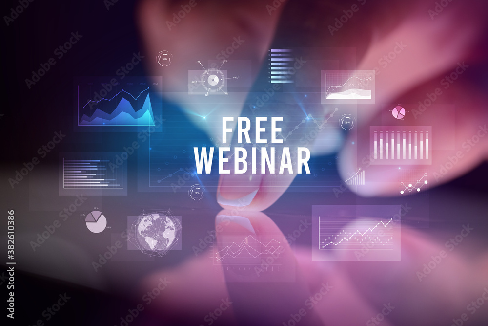 Finger touching tablet with charts and FREE WEBINAR inscription, business concept