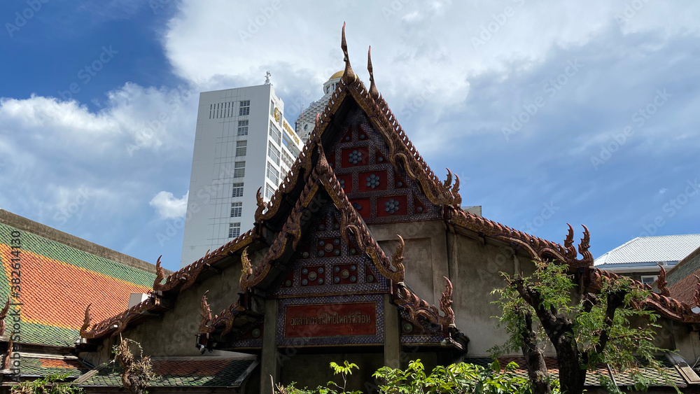 Old style that rooftop surrounded by modern buildings Old style that rooftop surrounded by modern buildings