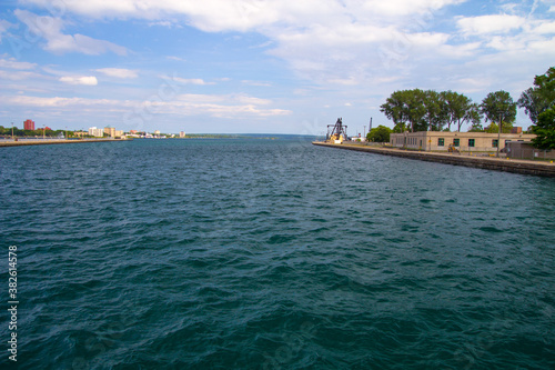 Fototapeta Sault Ste Marie Michigan and Ontario waterfront district on the St Mary's River on the border between Canada and the United States